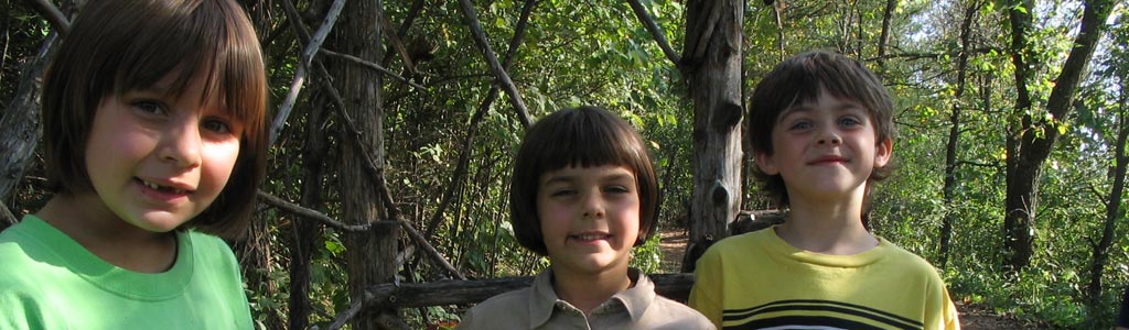 three children in woods